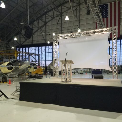 Panel stage and podium with stretch screen