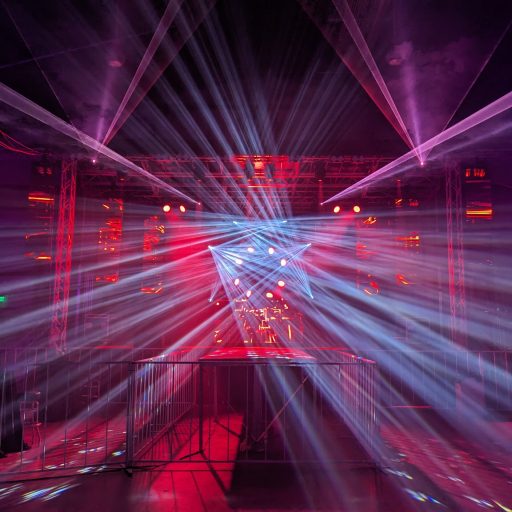 Static image of a concert lighting rig. Beams, gobos, sharpi, LED wash, moving head fixtures
