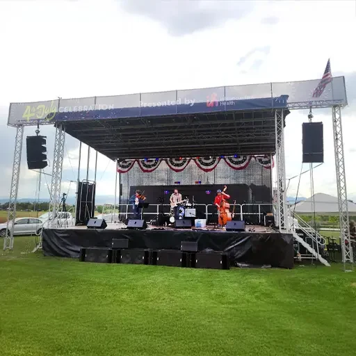 Outdoor portable stage with speakers setup
